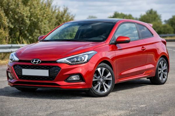 Hyundai i20 Coupe GB facelift 1.2 84 hp specs, practicality, fuel economy, and buyer tips. Stylish three-door petrol hatch with simple, low-stress ownership.
