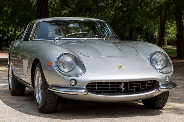 Ferrari 275 GTB/4 Tipo 596 specs, 300 hp four-cam V12 performance, chassis details, driving experience, values, and buying insights.