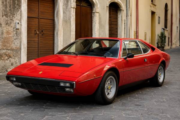 Ferrari Dino 308 GT4 specs: F106 AL 100 chassis, 2.9L carbureted V8, 240 hp, performance, maintenance risks, and buying guide.