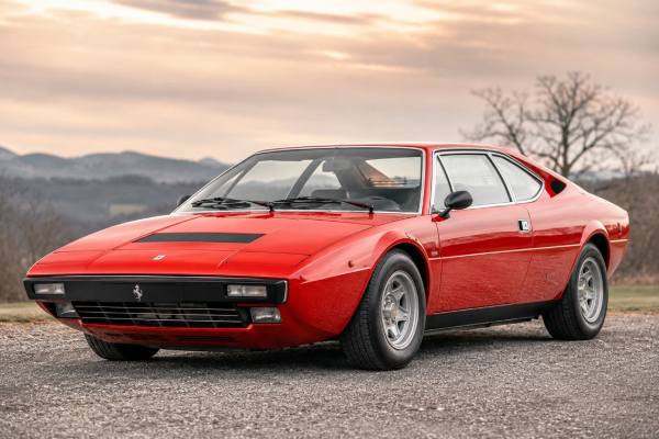 Ferrari Dino 308 GT4 specs: 255 hp 2.9L V8, F106 AL 100 chassis, performance, production details, reliability, values and buying guide.