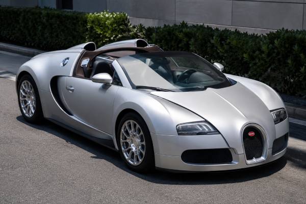 Bugatti Veyron 16.4 Grand Sport specs: 1,001 hp W16, removable roof, AWD, performance, collector value, options, and buying advice.