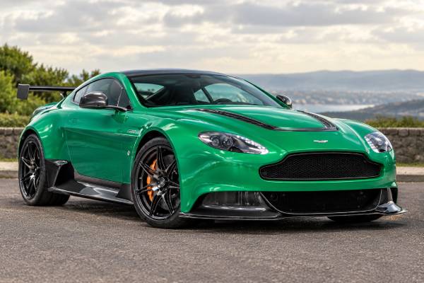 Aston Martin Vantage GT12 specs: 5.9L naturally aspirated V12, 592 hp, 625 Nm, seven-speed Sportshift III, 3.5-sec 0–100 km/h, and 185 mph top speed.