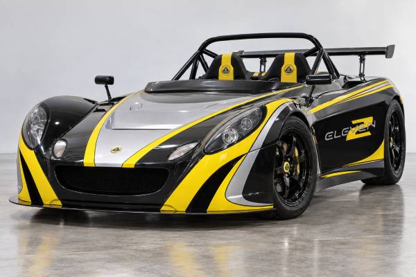 Lotus 2-Eleven Launch Edition Type 123 specs: 1.8L supercharged inline-four, 252 hp, 242 Nm torque, 6-speed manual, RWD, and 3.8-sec 0–60 mph.